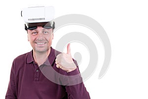 Man playing in virtual reality goggles happy smile thumbs up in white background with copy space