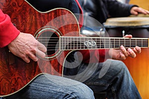 Man plays on acoustic guitar - Guitar player