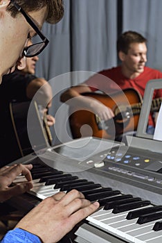 Man plays on electronic piano