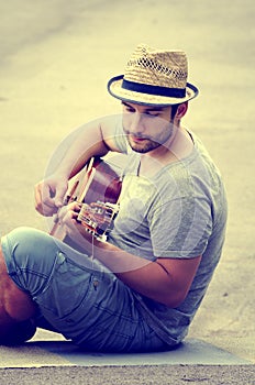 Man plays the guitar