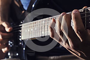 Man plays guitar