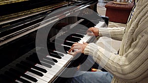 Man Plays Piano Showing Hands Only 2