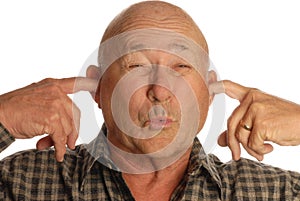 Man plugging ears photo