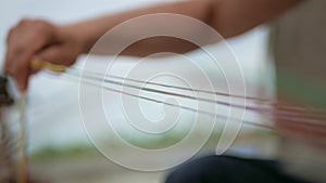 Man plugging in a fiber optic hub cable