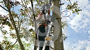 Man plugging in a fiber optic hub cable