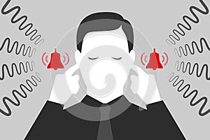 Man is plugging his ears with fingers when suffering from tinnitus