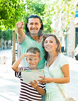 Man pointing the direction for family