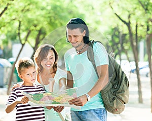 Man pointing the direction for family