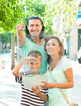 Man pointing the direction for family