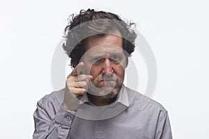 Man pointing finger at camera, horizontal