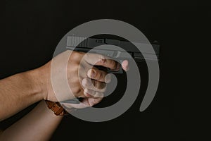 Man pointing gun ready to shoot, Killer with 9mm handgun pistol waiting for robbing the victim