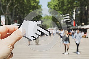 Man pointing Las Ramblas in Barcelona, Spain