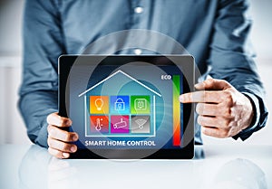 Man pointing to an interface for a smart house