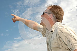 Man Pointing to the Sky