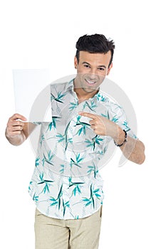 Man points to blank card. Handsome brazilian male wears summer c