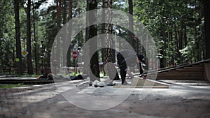 Man polishing a goods from wood in the skatepark