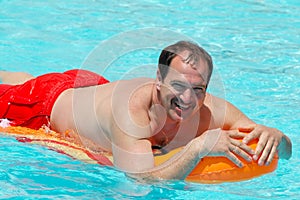 Man on a pool float