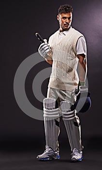 Man, portrait and cricket player with bat in studio for professional sports, competition or black background. Male