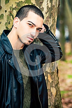 Man portrait outdoors. Handsome natural male