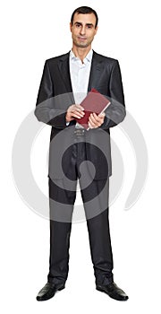 Man portrait in suit with book on white at studio