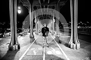 Man portrait under bridge in Paris