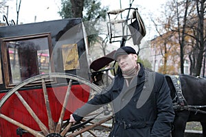 Man posing on brougham background