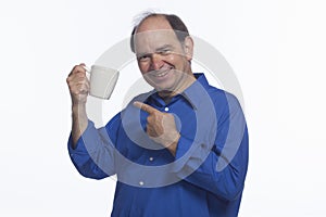 Man posing with coffee mug, horizontal