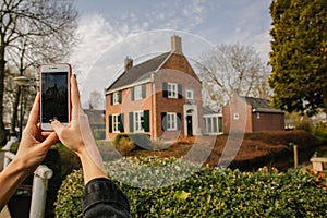 Man posing one beautiful house