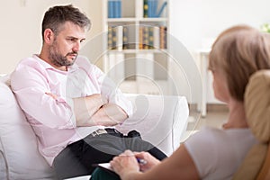 Man with post traumatic stress during psychotherapy