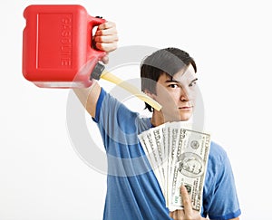 Man pouring gas on money.