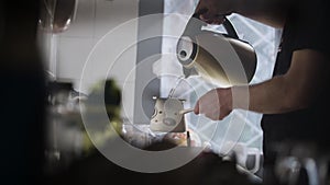 Man Pouring Steaming Hot Water In A Turkish Coffee Pot 3