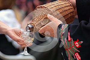 Man is pouring wine