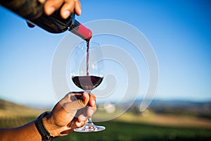 Man pouring wine