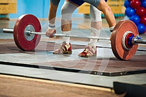 Man of powerlifter squat competition deadlift