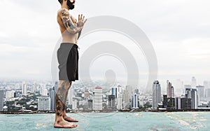 Man Practice Yoga at Rooftop Concept