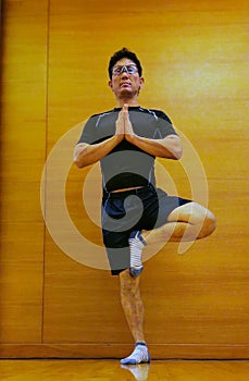 Man practiced yoga exercise flexible balance
