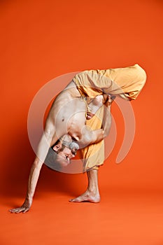 Man practicing advanced yoga. A series of yoga poses.