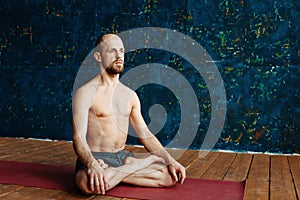 Man practicing advanced yoga. A series of yoga poses. Sport concept