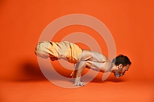 Man practicing advanced yoga