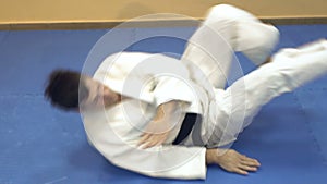 Man practicing aikido, slow motion.