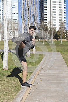 Man practicing Kung Fu in the park