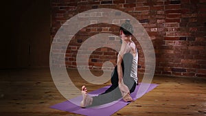 Man practicing yoga indoors