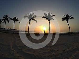 Man practicing yoga ocean beach salalah Oman 6