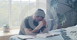 Man praying and murmuring photo