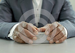 man praying to god with bible with background with people stock image stock photo