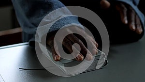 man praying to God with bible and worshipping with hands together Caribbean man praying with people stock video stock footage