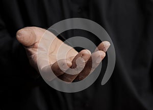 man praying to god with black grey background with people stock image stock photo