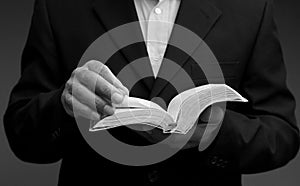 man praying to god with black grey background with people stock image stock photo