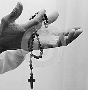 man praying to god with black grey background with people stock image stock photo