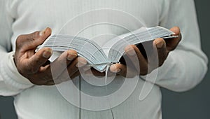 man praying to God worshipping with hands together with people stock image stock photo